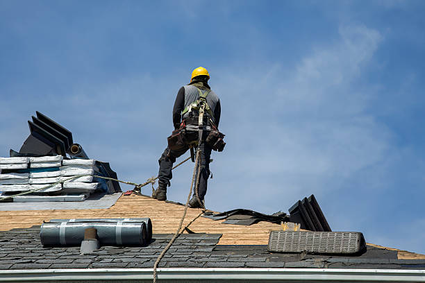 Professional Roof Replacement technician working in Sayre, OK